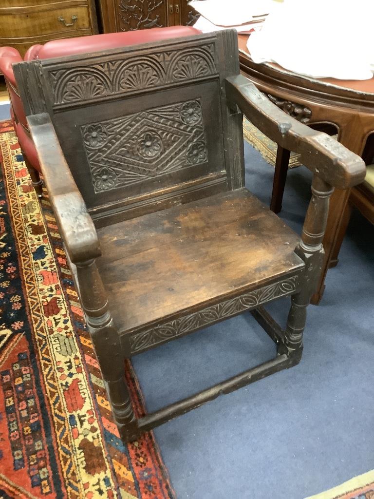 An oak wainscot chair, width 59cm, depth 50cm, height 86cm